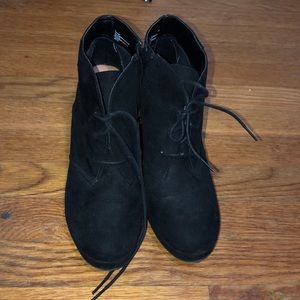 Black suede heeled booties with laces
